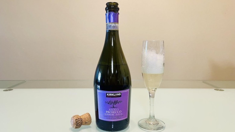 Glass and bottle of Kirkland Signature Asolo Prosecco Superiore D.O.C.G.