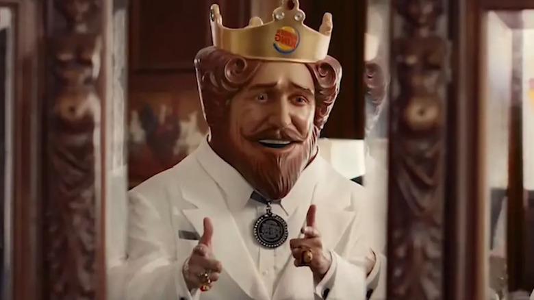 Burger King's Creepy King in white suit looking in mirror
