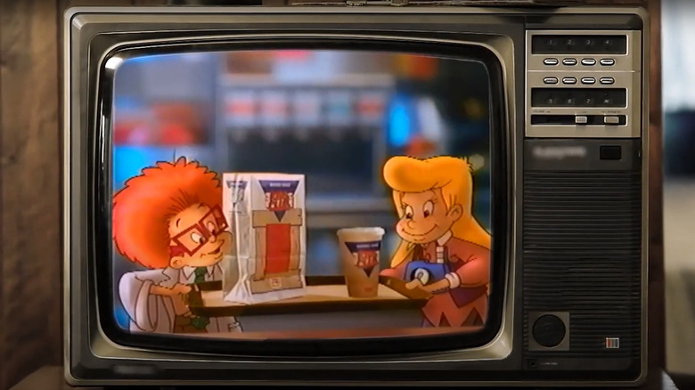 Two of the Kid Club, Burger King's animated group of pre-teens, holding a tray of Burger King Food