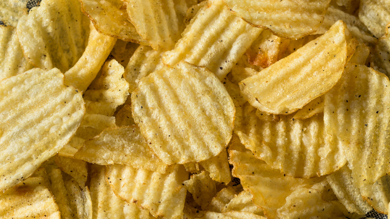 Close-up image of wavy cut potato chips