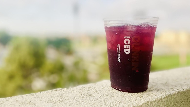 Dunkin' Blueberry Breeze Refresher sitting on ledge