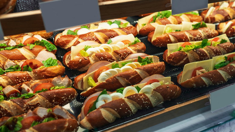 Sandwiches inside a case at a coffee shop