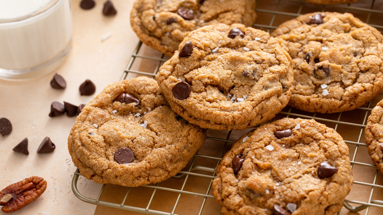Baked chocolate chip cookies served on cooling rack