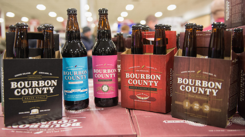 Assorted sets of bottled Goose Island Bourbon County Stouts inside a store