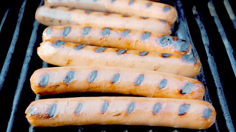 hot dogs on grill