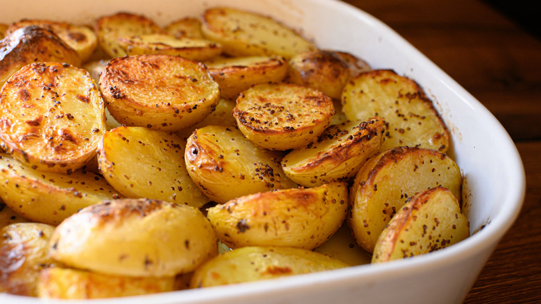 Roasted yellow potatoes in dish