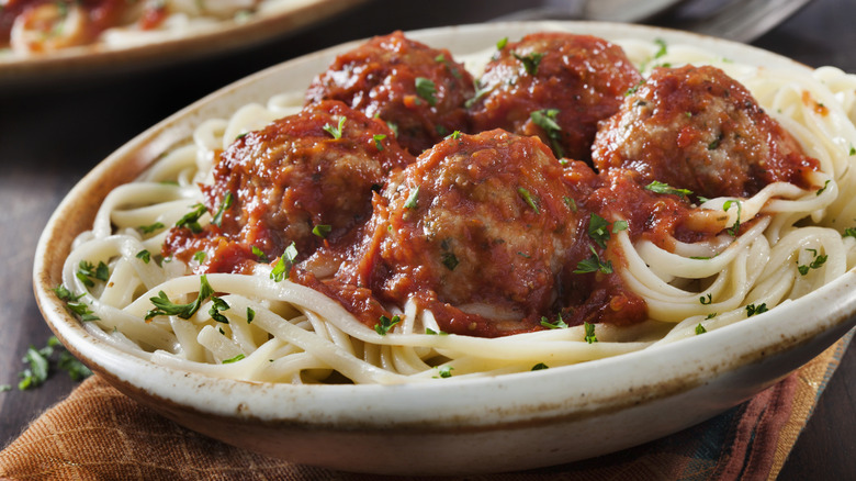Spaghetti and meatballs with herbs