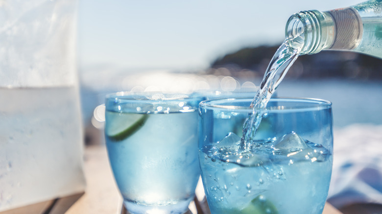 ice water in blue glasses