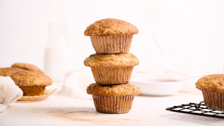 cinnamon banana muffins stacked on table