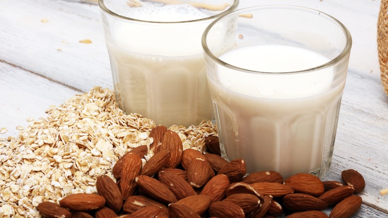 Almond milk and oat milk side by side