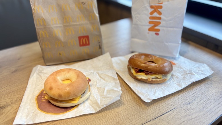 two breakfast sandwiches on table