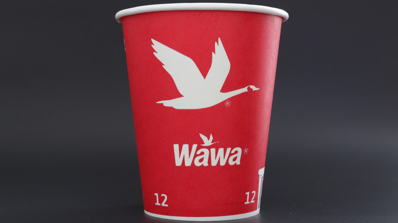A close up on a Wawa branded red cup