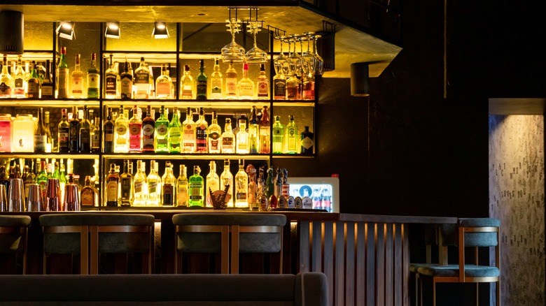 Bar wall display with top-shelf alcohol