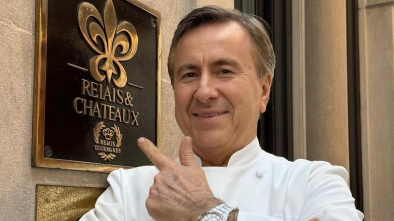 Chef Daniel Boulud in front of his restaurant, Relais & Chateaux