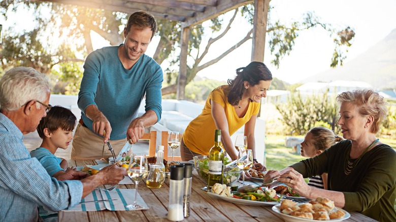 Family enjoying an outdoor dinner