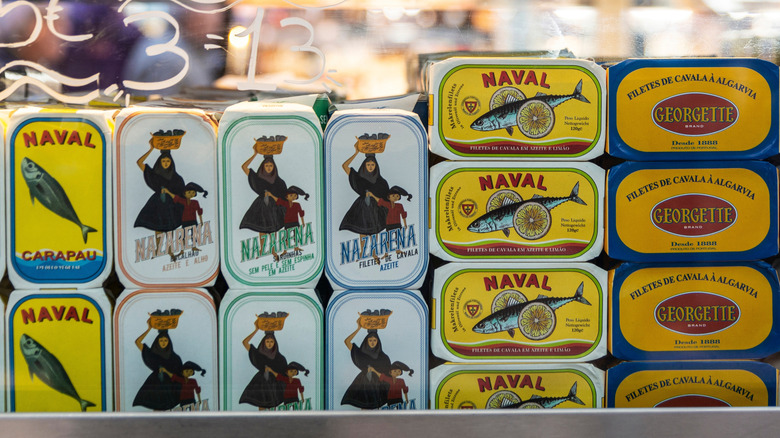 A storefront full of different brands of canned sardines.