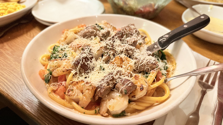 Olive Garden Calabrian Steak and Shrimp Bucatini in bowl
