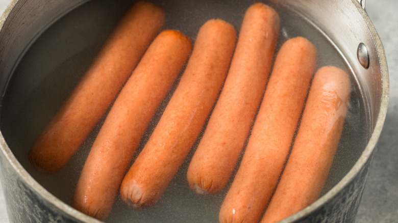 Hot dogs in a pot of water