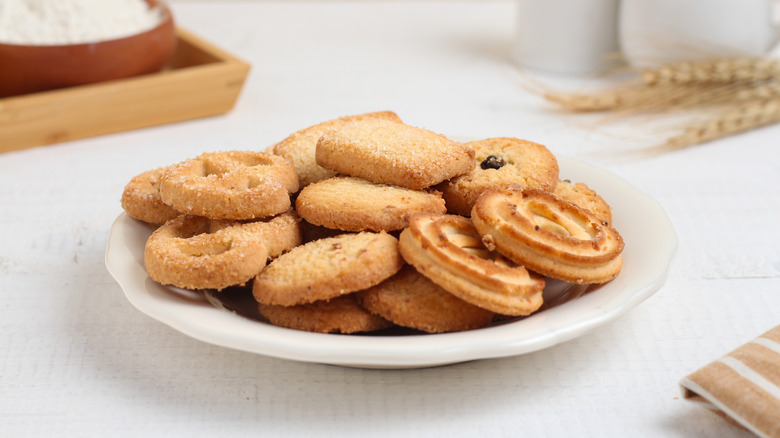 A selection of butter cookies on a white plate