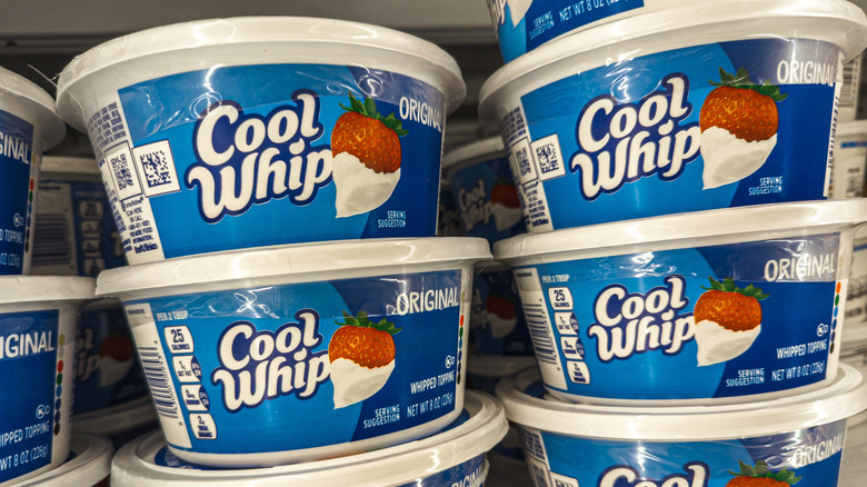 Cool Whip tubs on a store shelf