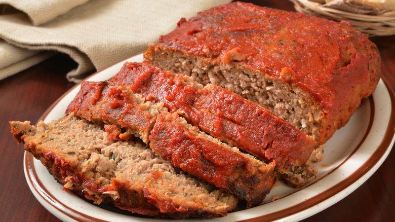 Meatloaf covered in a thick tomato sauce