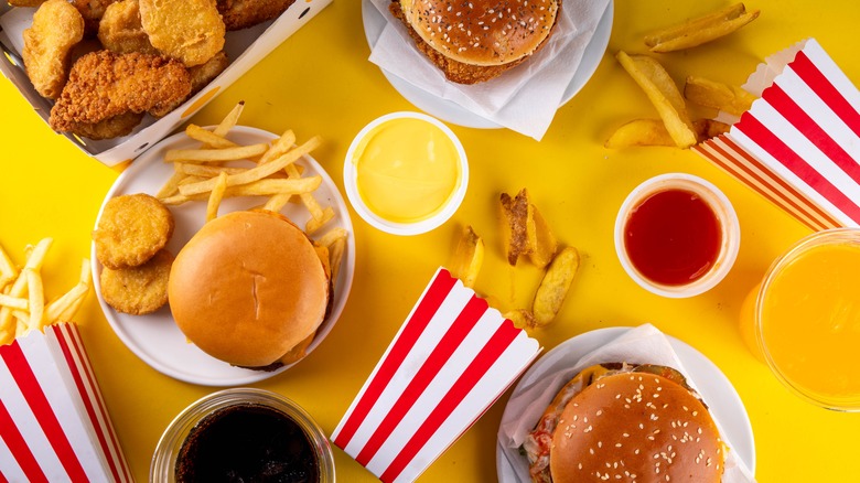 Various fast food sauces, nuggets, burgers, and fries