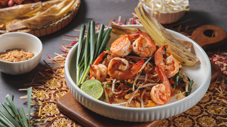 Pad Thai with shrimp in a white ceramic bowl