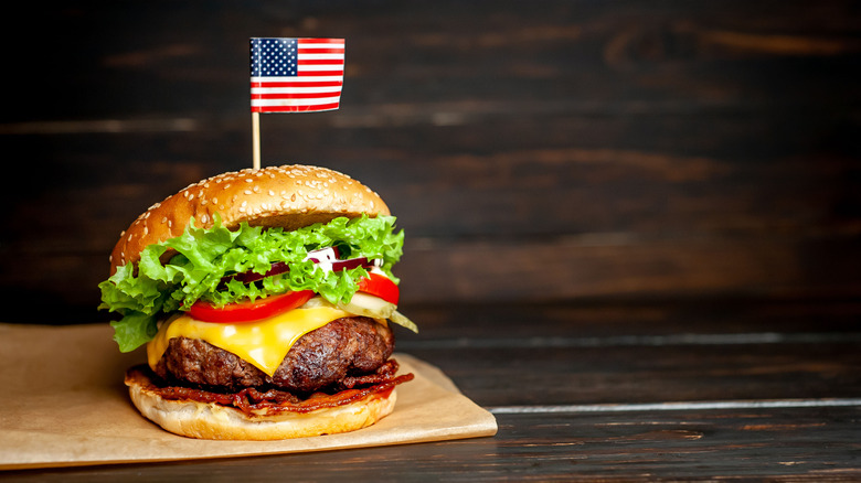 a cheeseburger with a U.S. flag on it