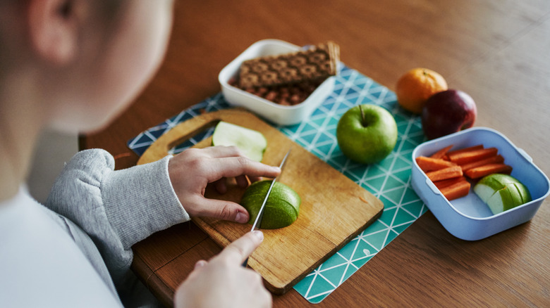 A child packing a lunch
