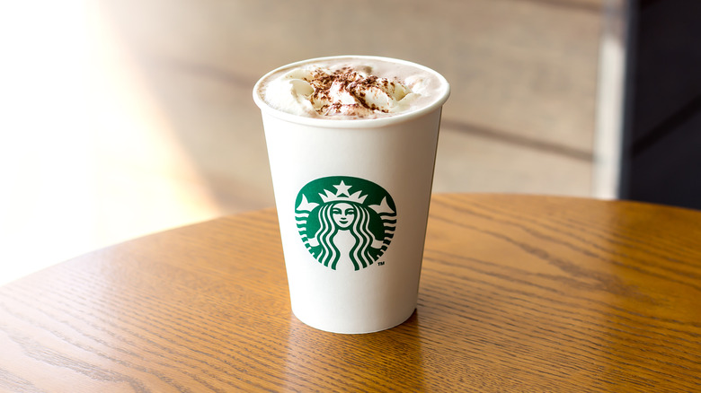 Starbucks' pumpkin spice latte in a to go cup