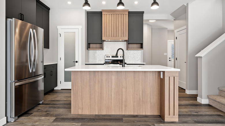 Modern kitchen with a kitchen island and faucet
