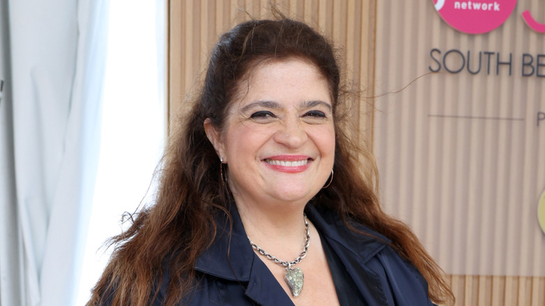 Alex Guarnaschelli smiling at an event.