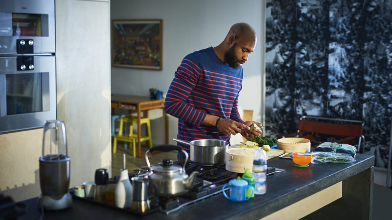 Person preparing food in kitchen