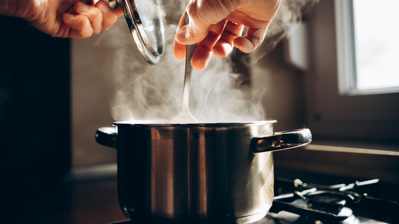 soup steaming in pot on the stove