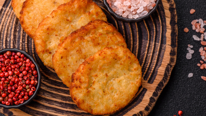 Cooked hash brown patties with seasonings