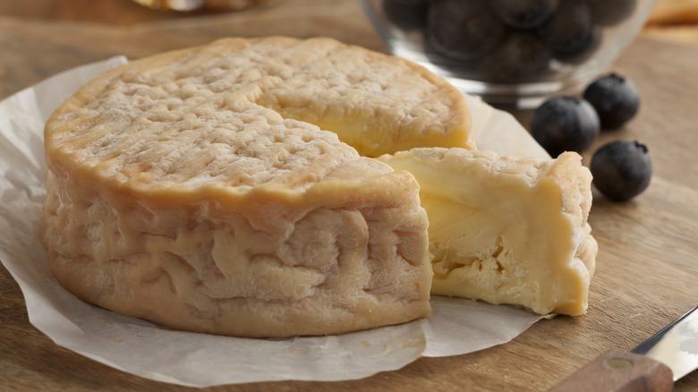 A close up of creamy ripe Epoisses cheese