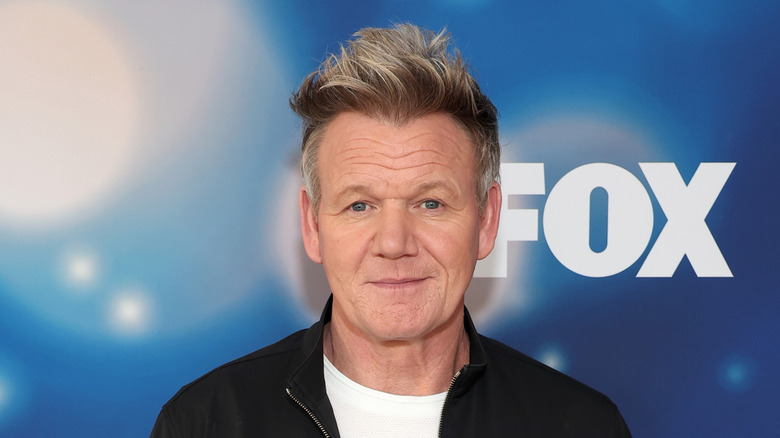 Gordon Ramsay smiling at an event
