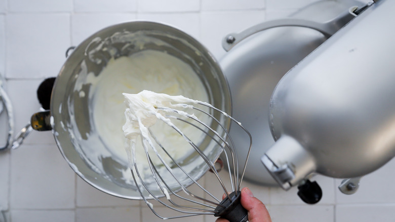 Mixing cream cheese filling