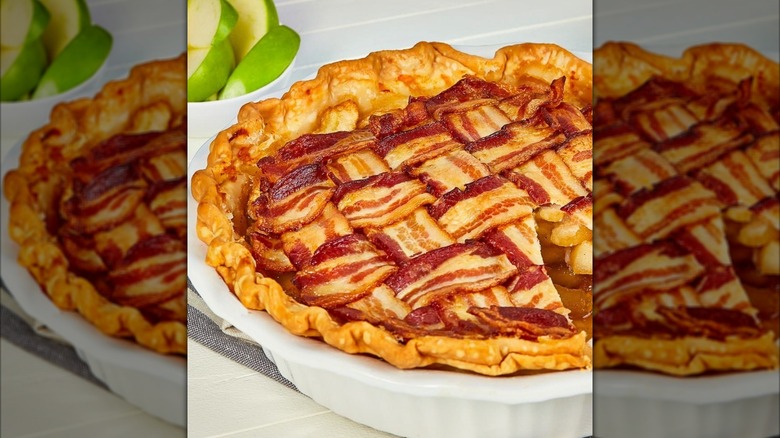 Slices of bacon woven together on top of an applie pie