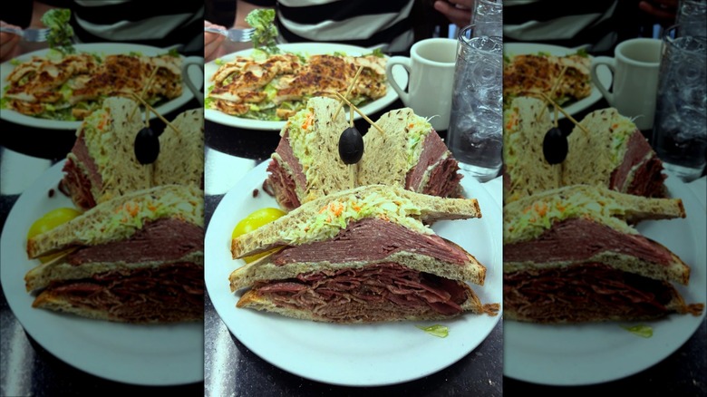 Sandwich at Fisher's Deli on a white plate