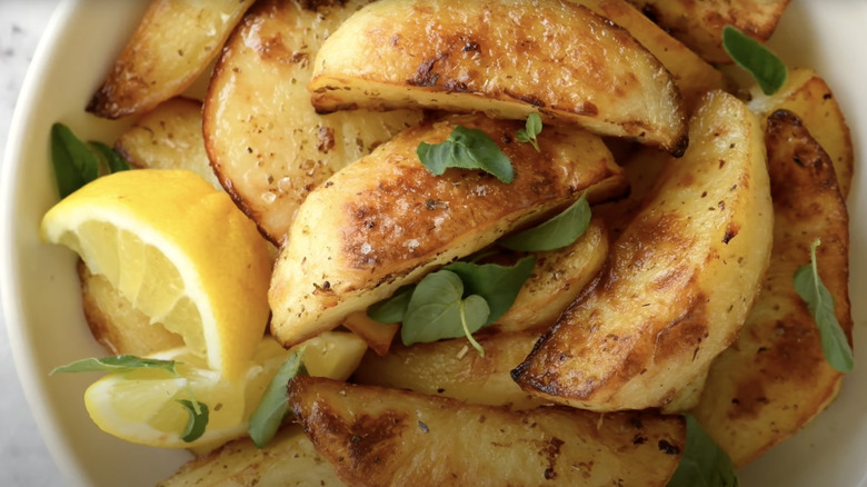Close-up of Greek potatoes with lemon