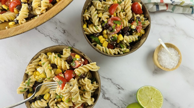 two bowls of pasta salad