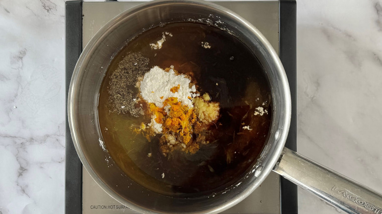 orange sauce ingredients in saucepan