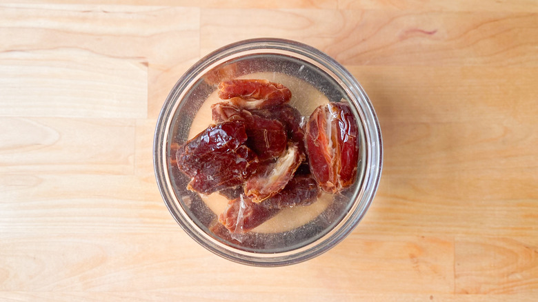 Medjool dates soaking in water