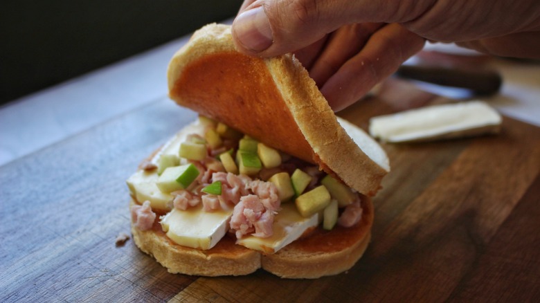 adding second slice of bread to sandwich