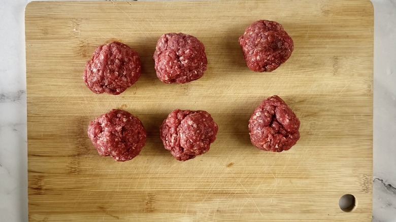 six balls of ground beef