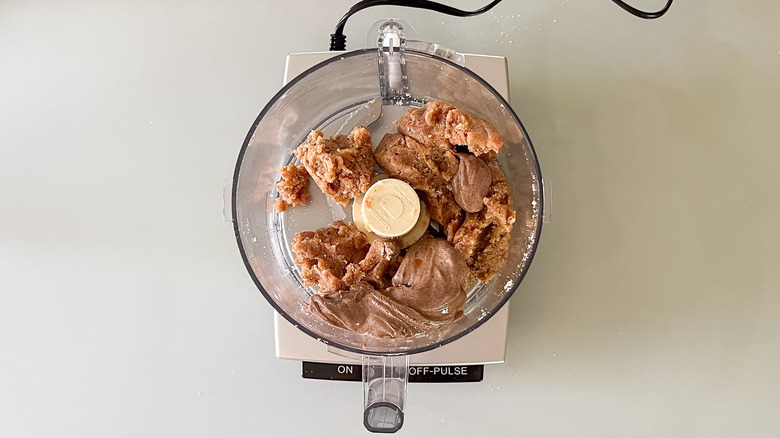 Date and almond flour dough with almond butter in food processor