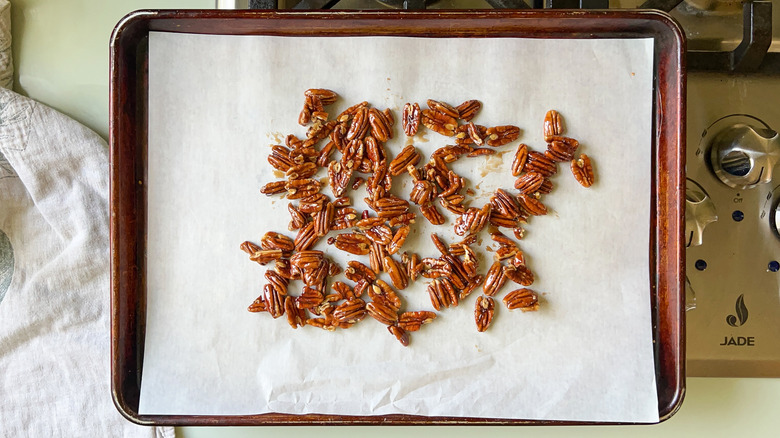 Glazed pecans on sheet pan