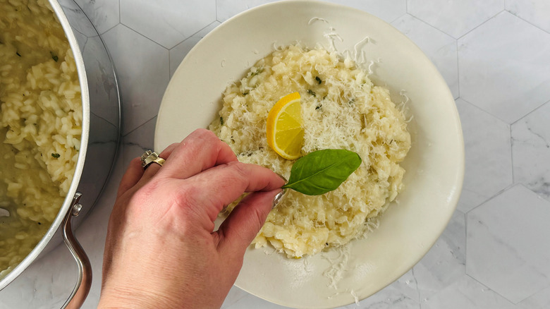 garnishing bowl of lemon basil risotto