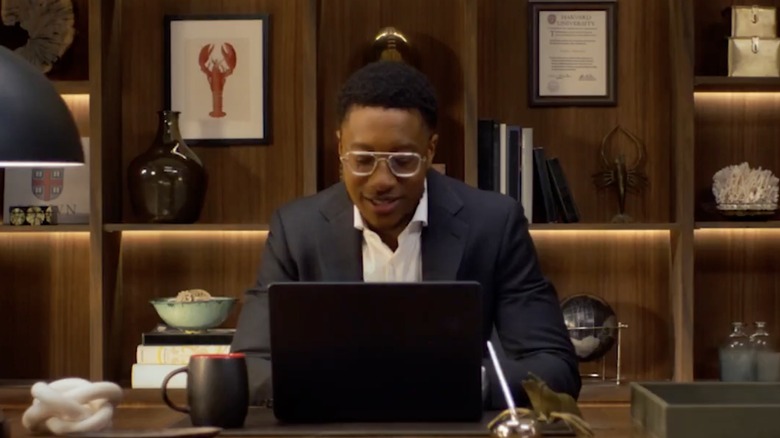 Red Lobster CEO Damola Adamolekun working in an office space